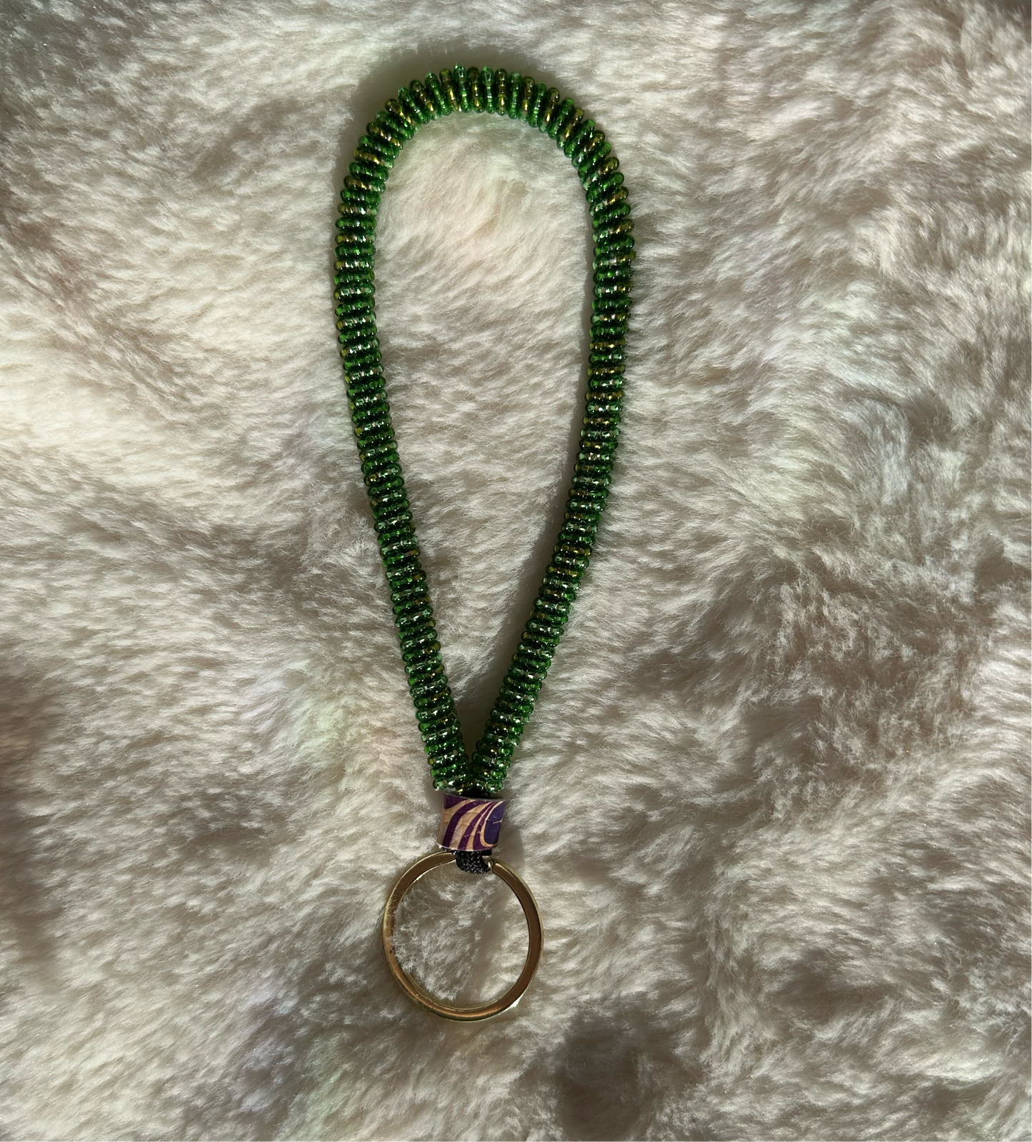 Green and gold beaded wristlet